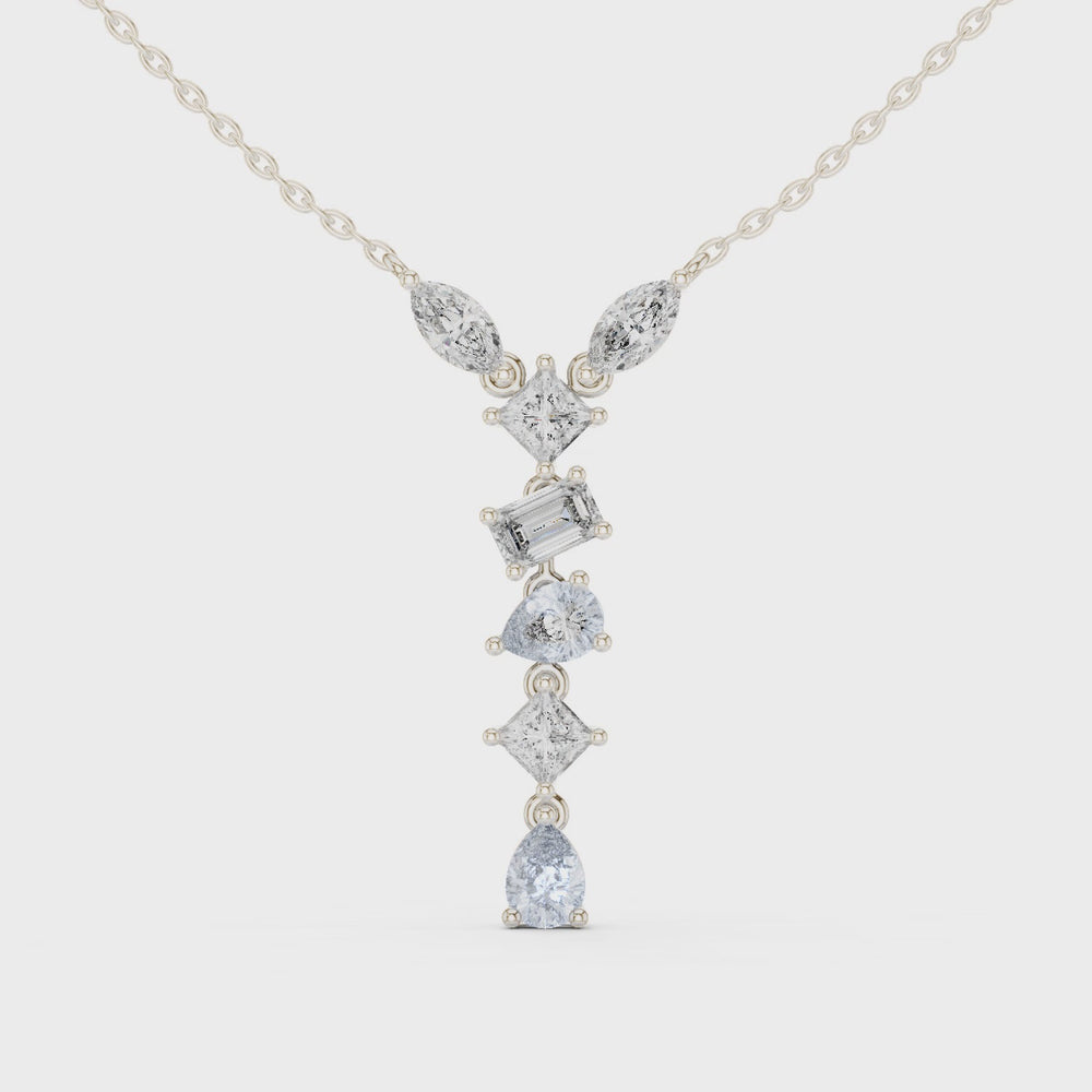 Multi shape journey diamond drop necklace with marquise, emerald, cushion and pear cut stones