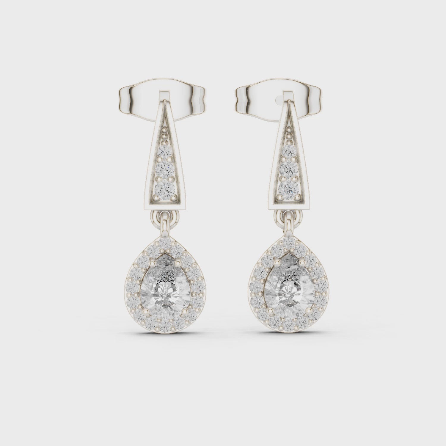 Geometric drop dangle earrings with tapered bar and oval cluster detailing
