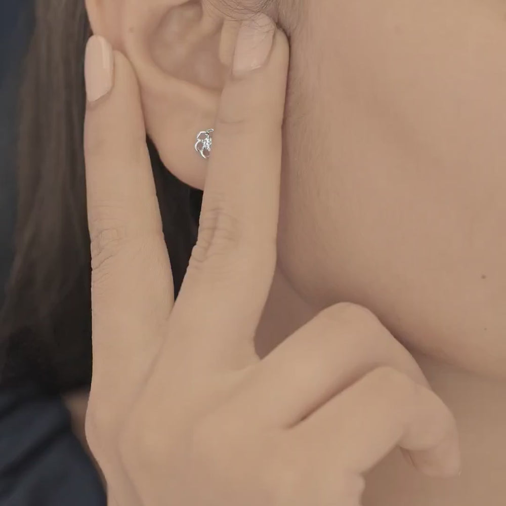Phool baali stud earrings with five-petal floral frame and round centre stone