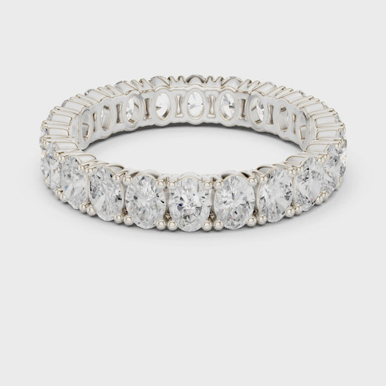 Full eternity oval cut diamond band ring with prong setting