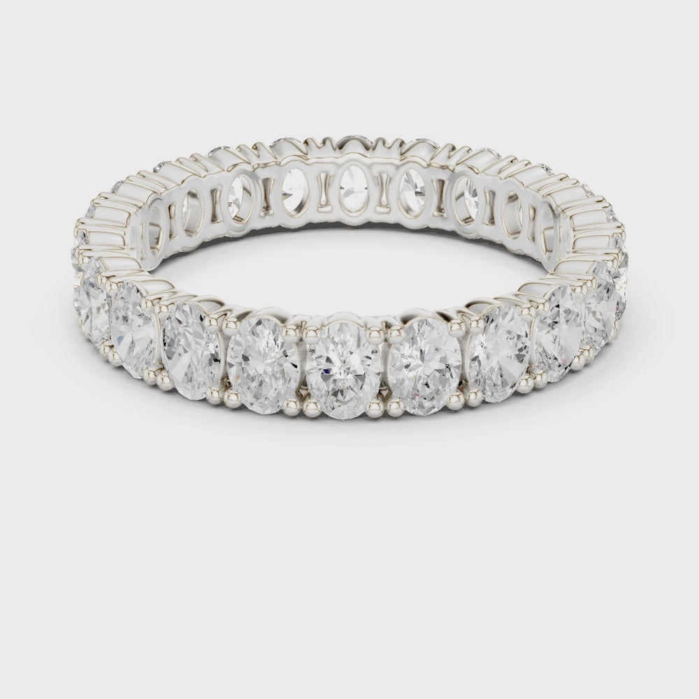 Full eternity oval cut diamond band ring with prong setting