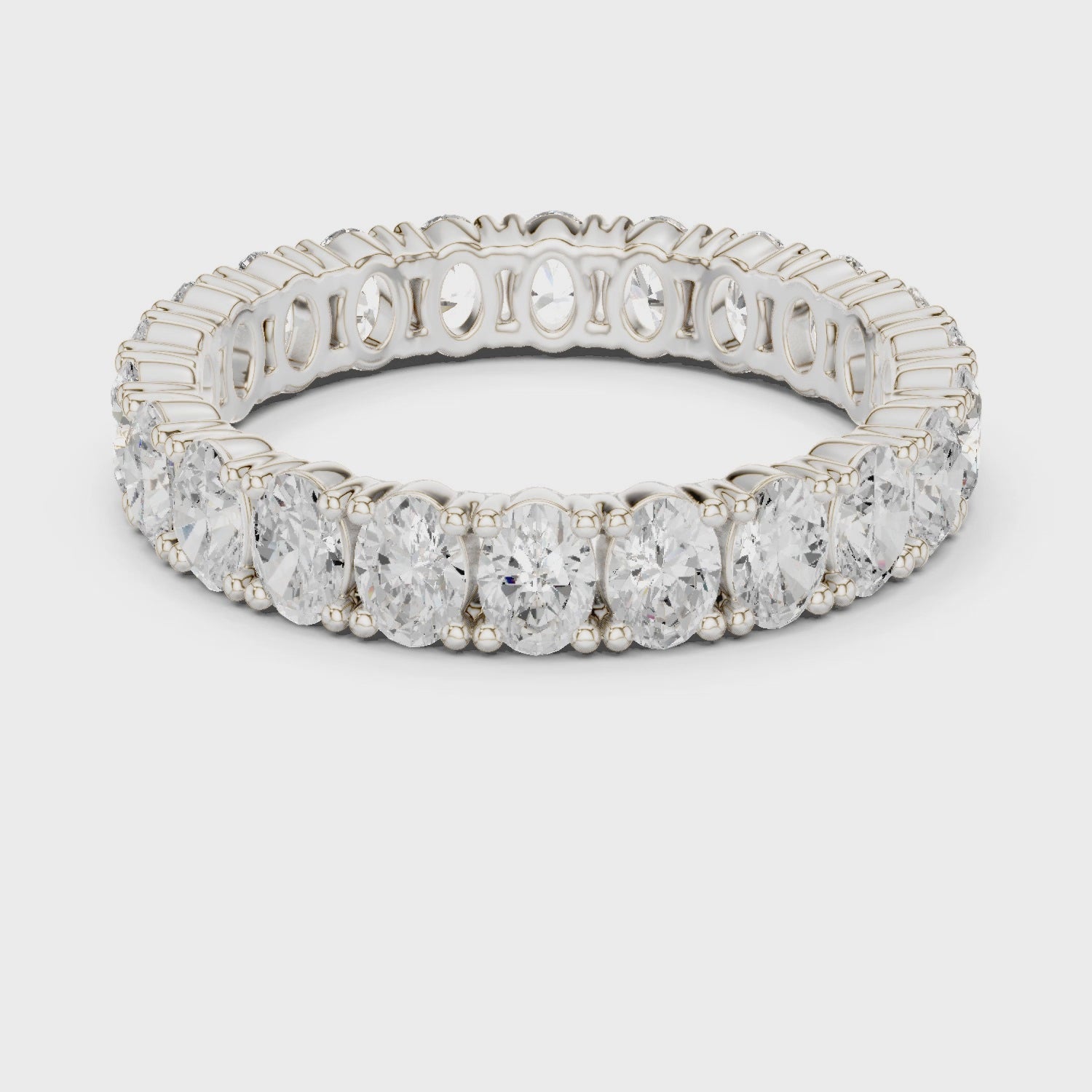 Full eternity oval cut diamond band ring with prong setting