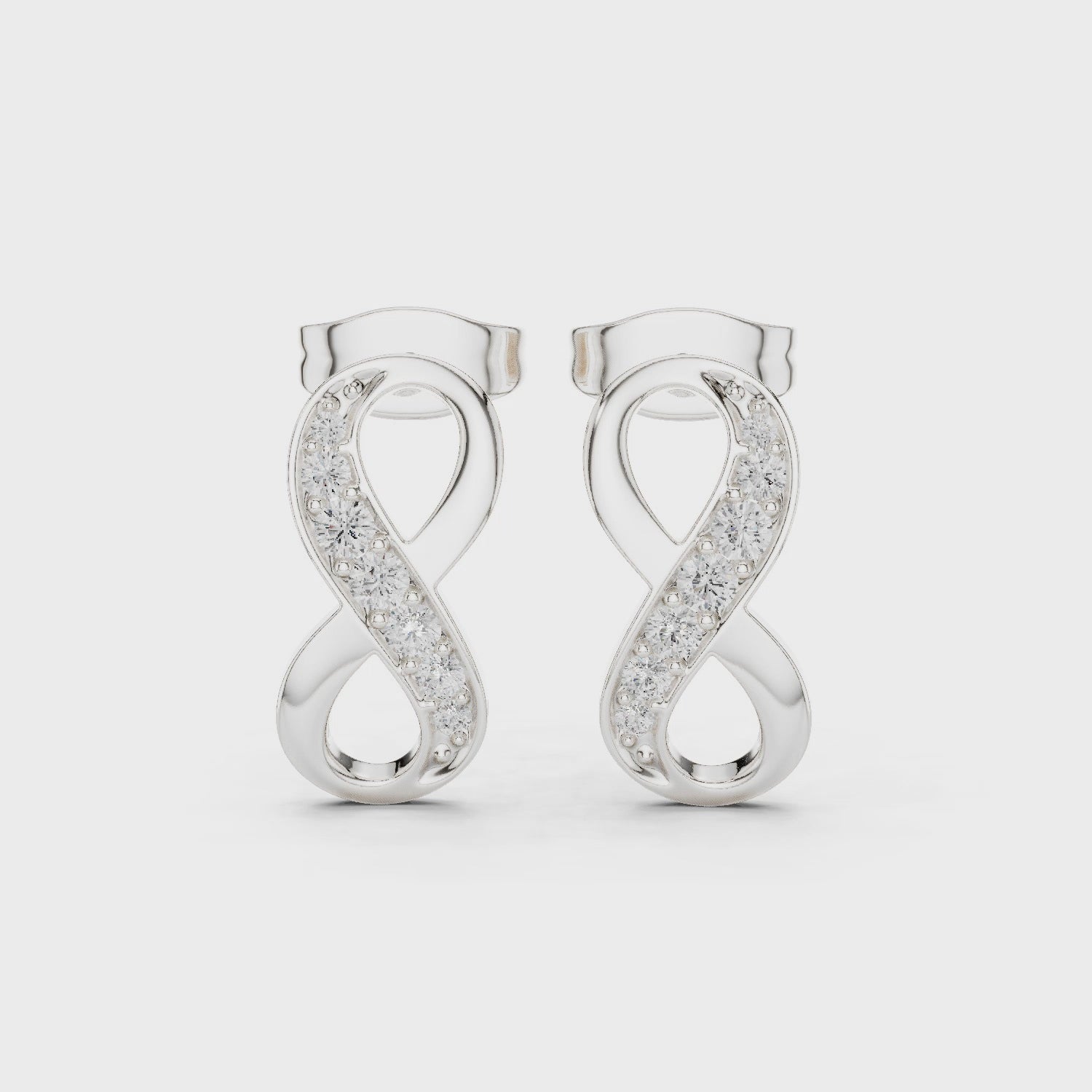 Infinity symbol pave diamond stud earrings with push back setting