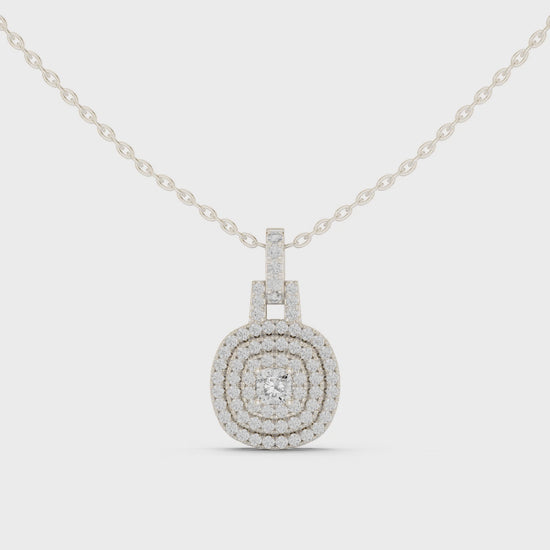 Double halo cushion cut diamond pendant necklace with pave cluster setting