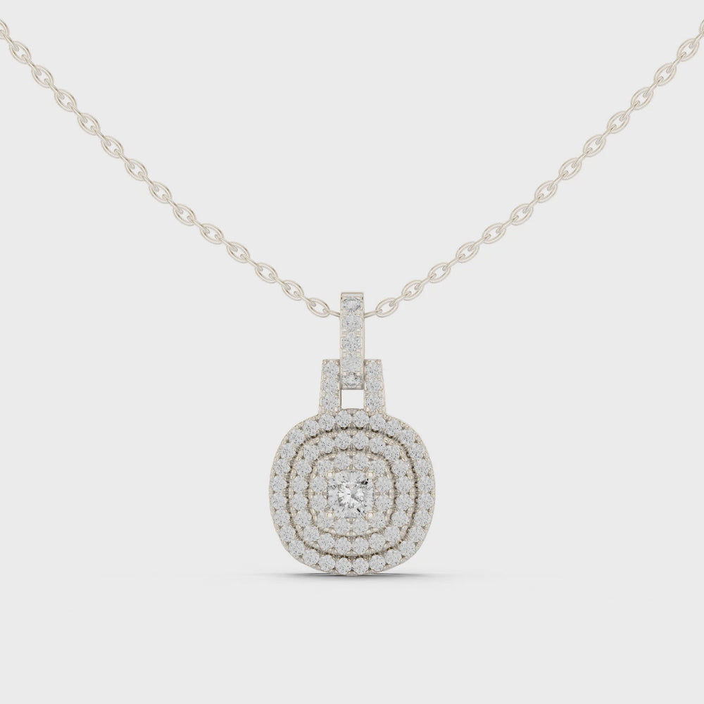 Double halo cushion cut diamond pendant necklace with pave cluster setting