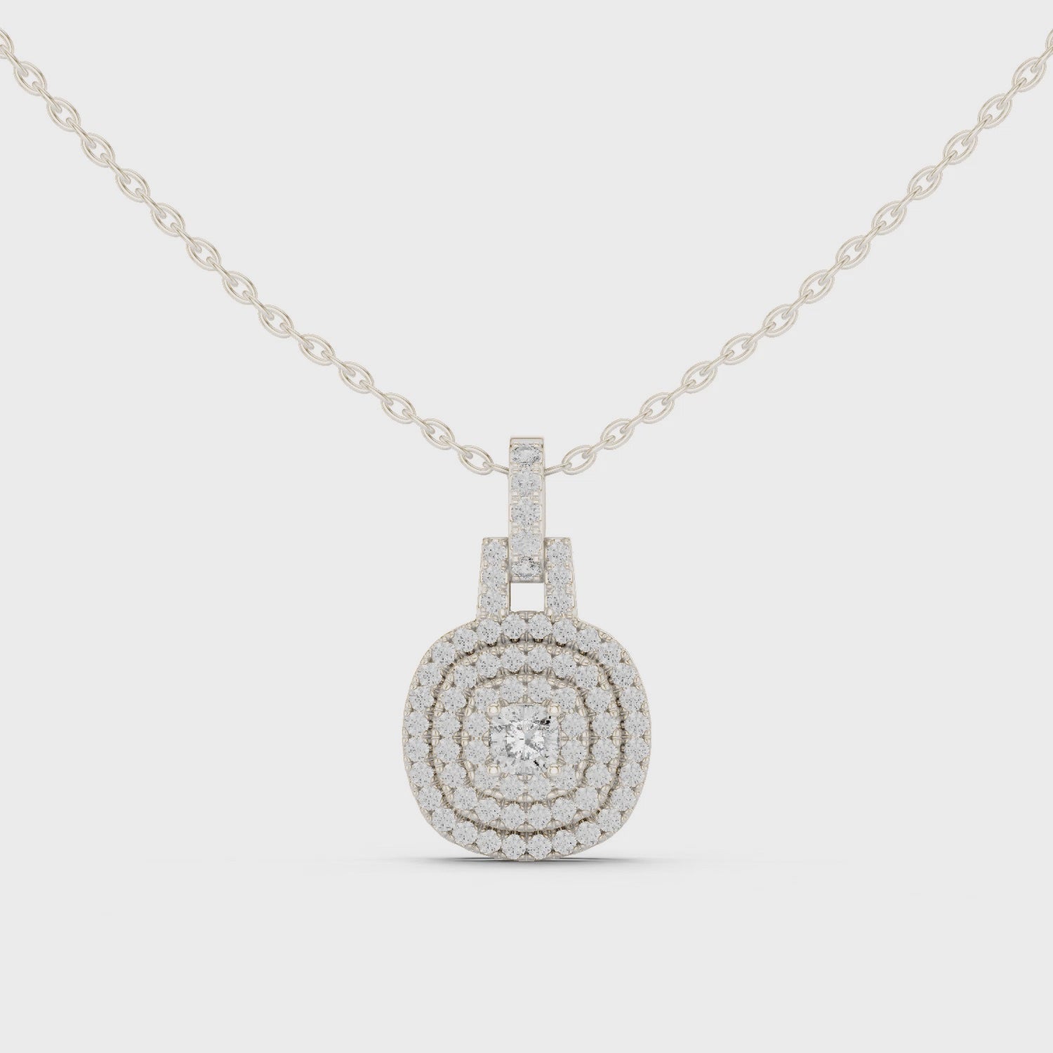Double halo cushion cut diamond pendant necklace with pave cluster setting