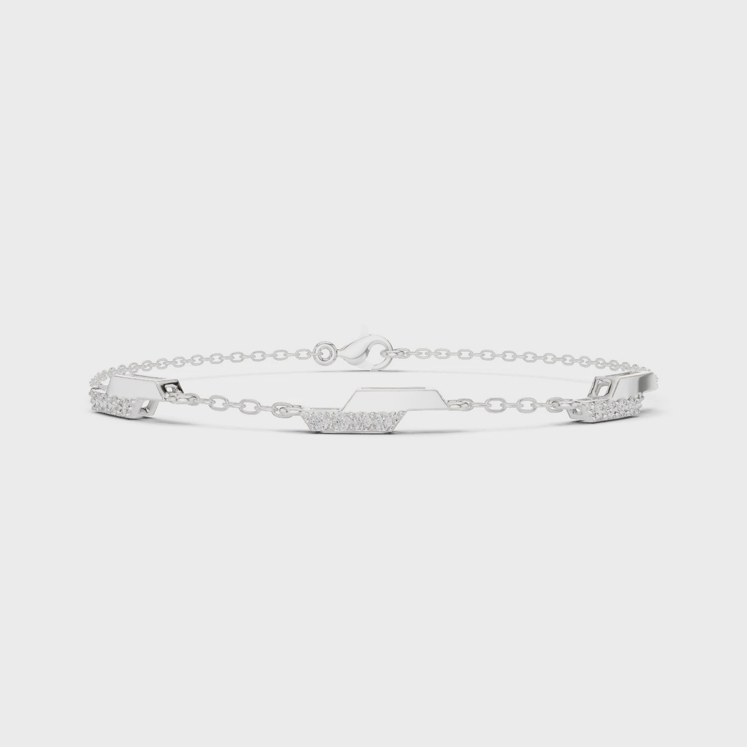Hexagon station chain bracelet with baguette and pave set stone detailing