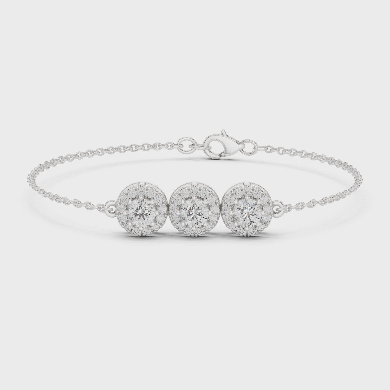 Triple floral cluster chain bracelet with sparkling round stone centre detailing