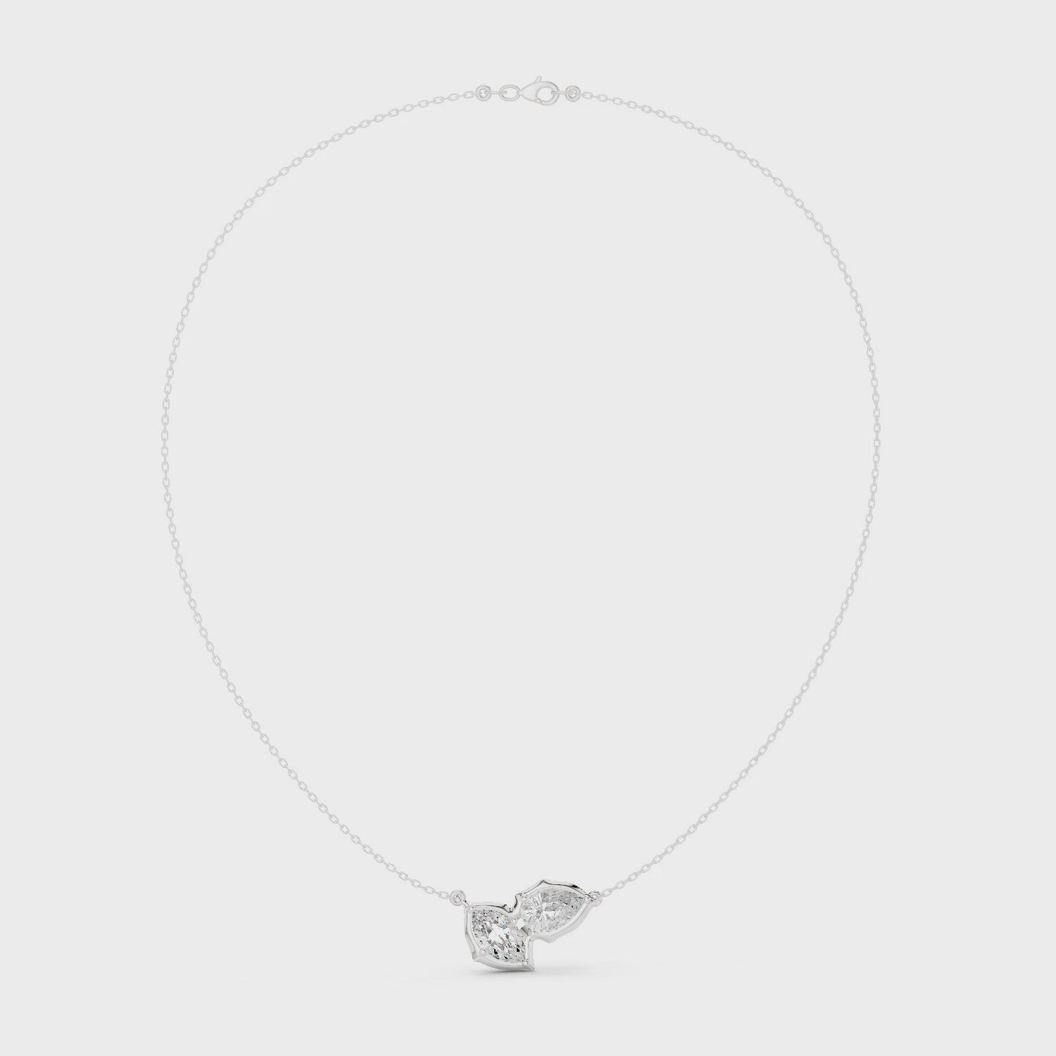 Toi et moi marquise and pear cut bezel set diamond necklace