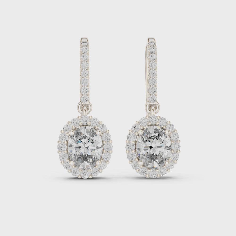 Halo solitaire hook drop earrings with pave set stone detailing