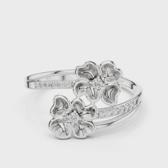 Double blossom bypass ring with sculpted petals and channel set band