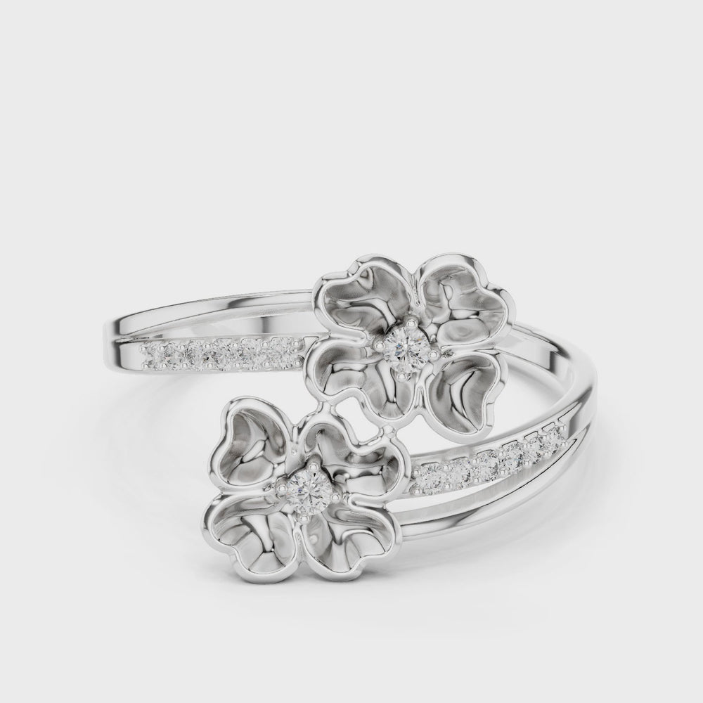 Double blossom bypass ring with sculpted petals and channel set band