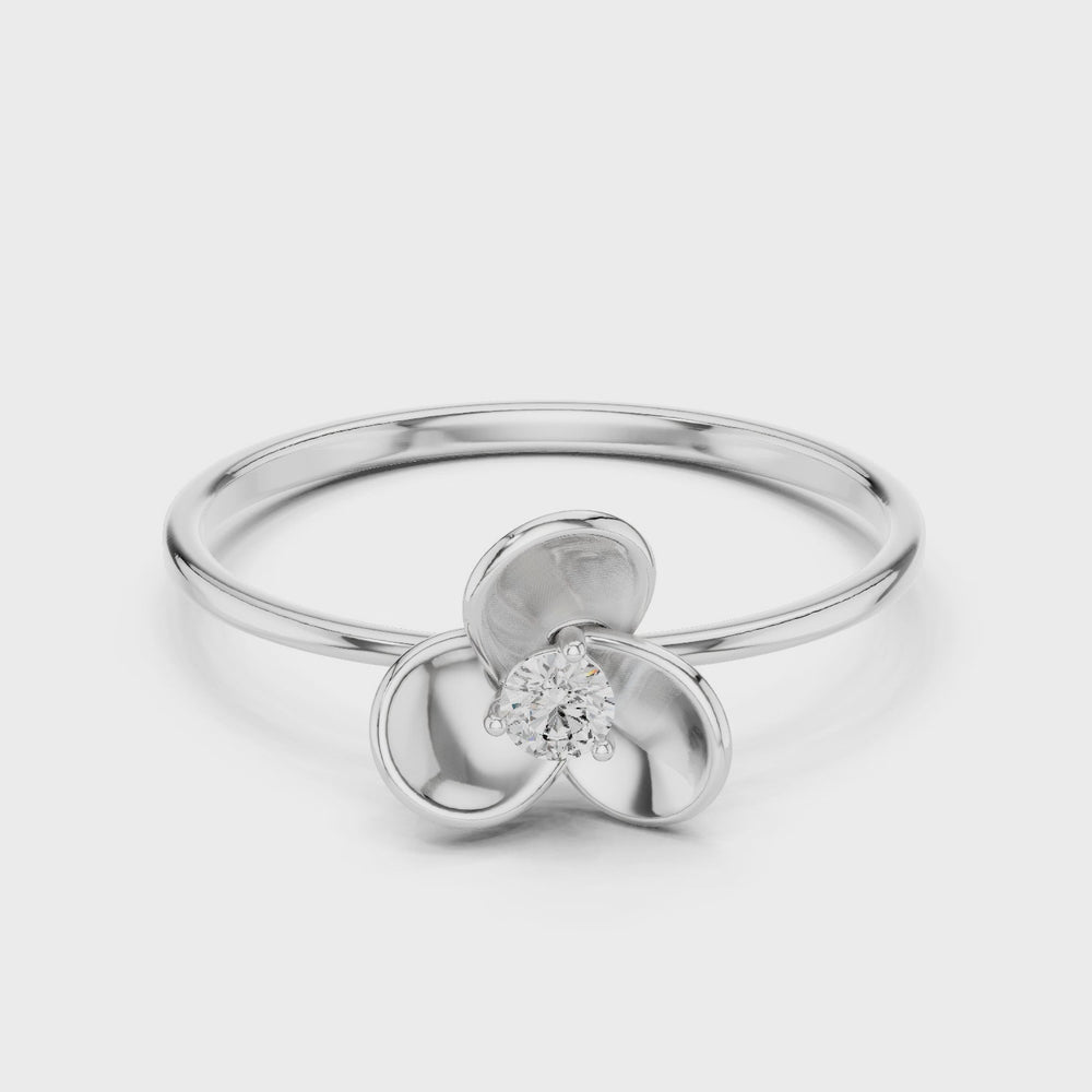 Three petal floral solitaire ring with sculpted bloom and polished rounded band