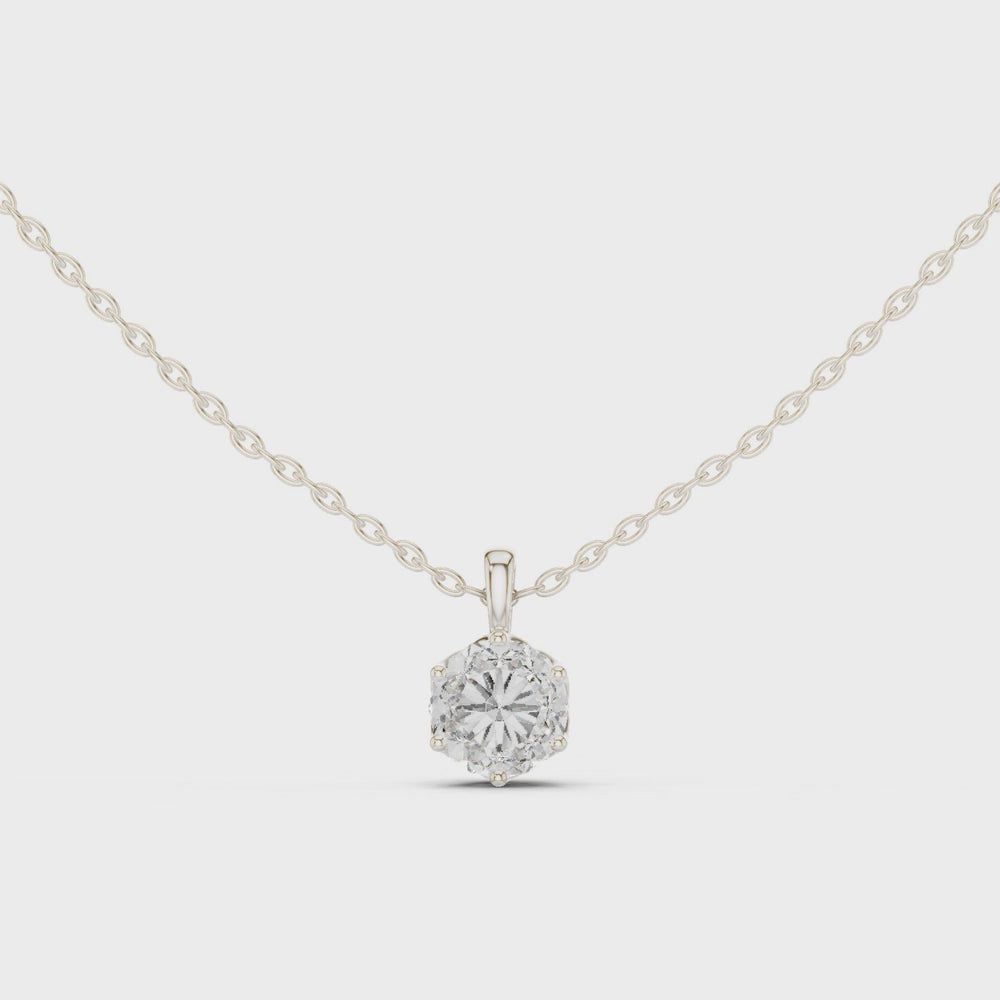 Round brilliant solitaire diamond pendant necklace with filigree basket setting