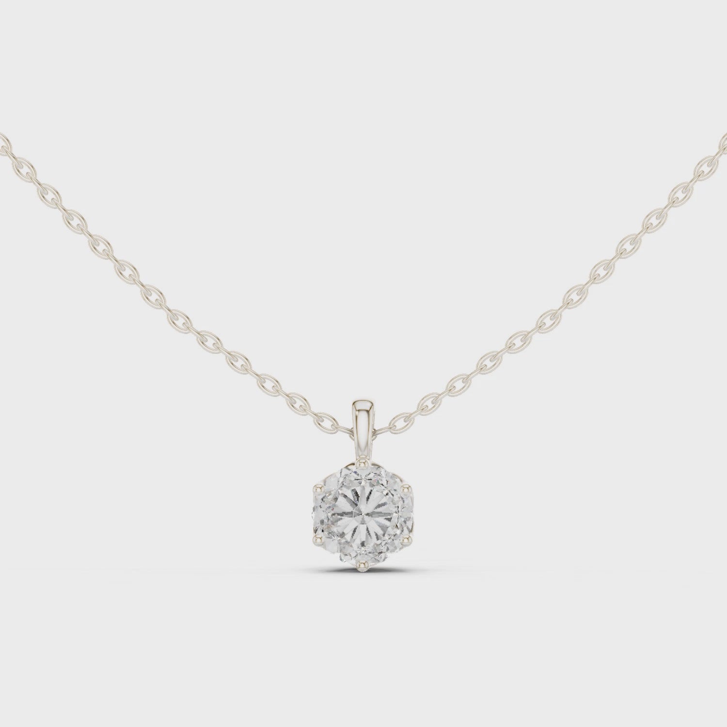 Round brilliant solitaire diamond pendant necklace with filigree basket setting