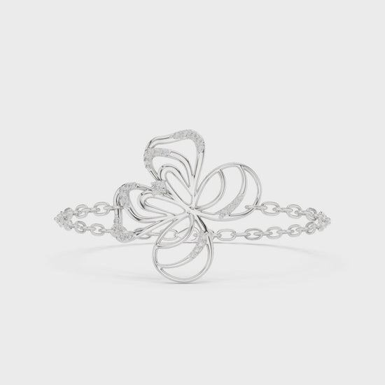 Twisted floral charm bracelet with blue crystal beads on a link chain