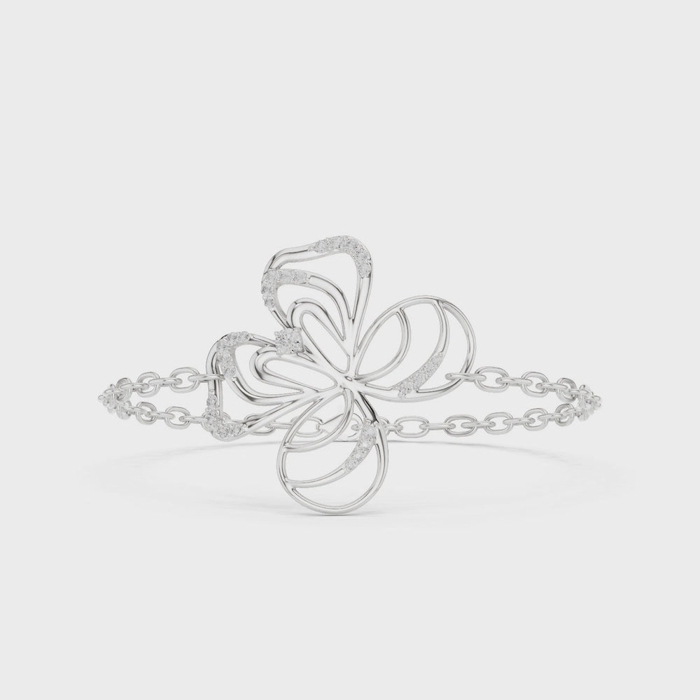 Twisted floral charm bracelet with blue crystal beads on a link chain