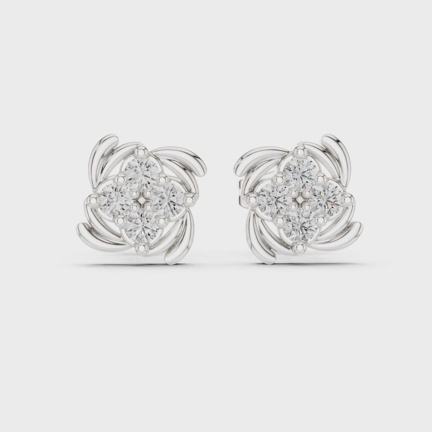 Knot stud earrings with sparkling stone centre detailing