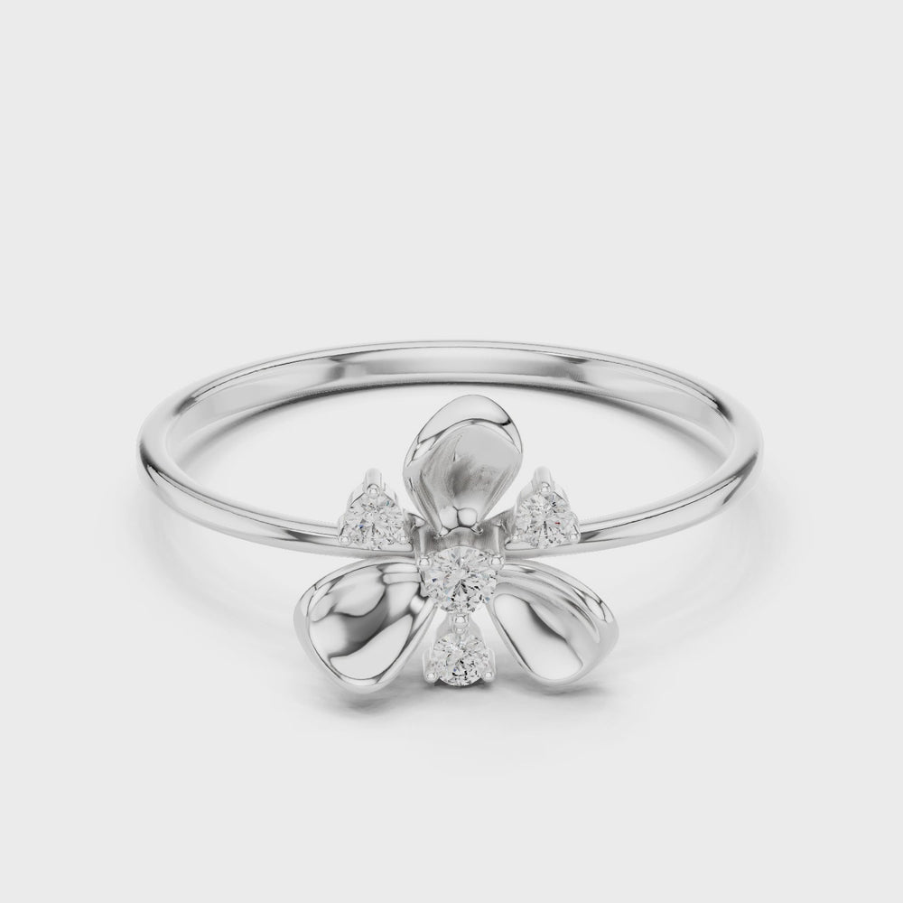 Bow cluster delicate ring with sparkling stones and dainty thin band