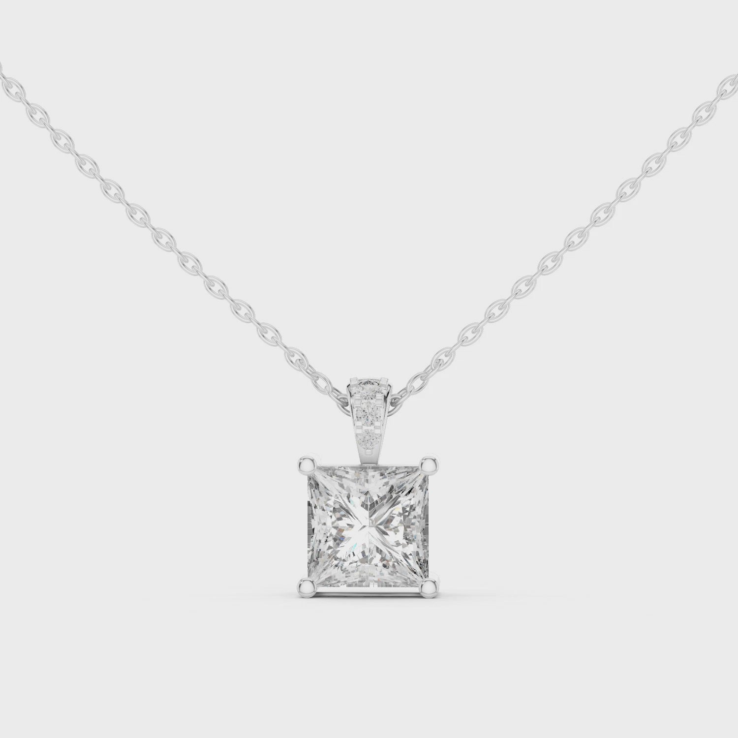 Princess cut solitaire diamond pendant with pave bail and four bar setting
