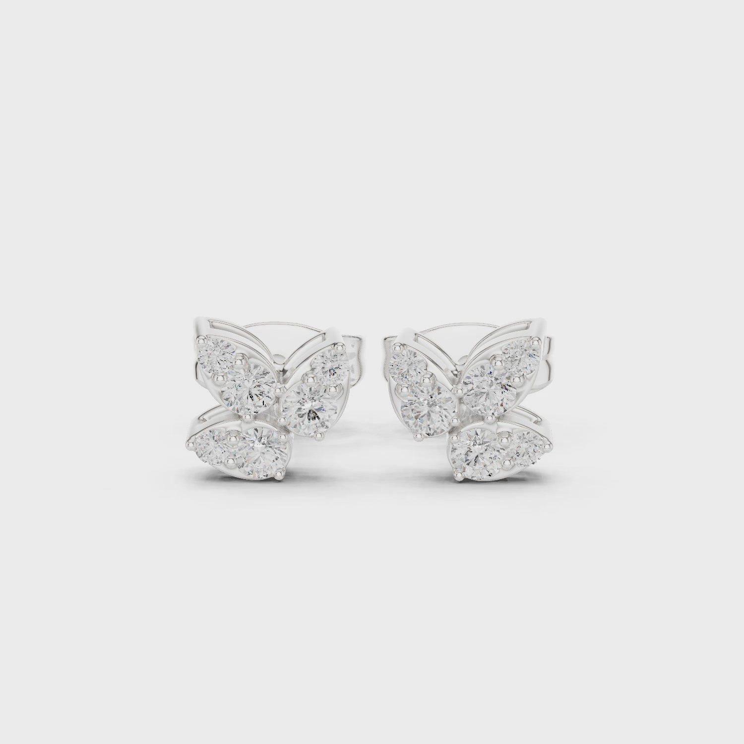 Floral marquise cluster diamond stud earrings with four petal design and push back setting 