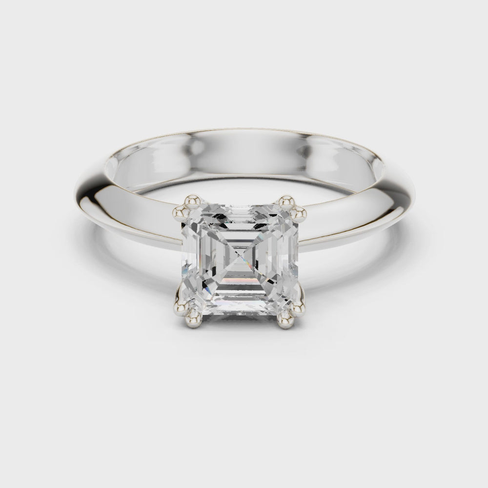 Asscher cut solitaire engagement ring with eight prong basket setting and wide polished band