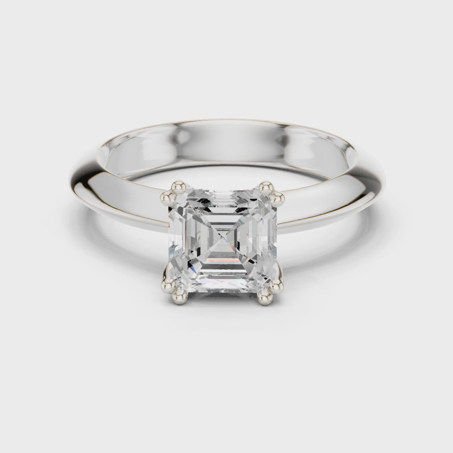 Asscher cut solitaire engagement ring with eight prong basket setting and wide polished band