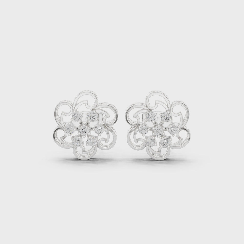 Filigree floral stud earrings with intricate scrollwork and open lattice design