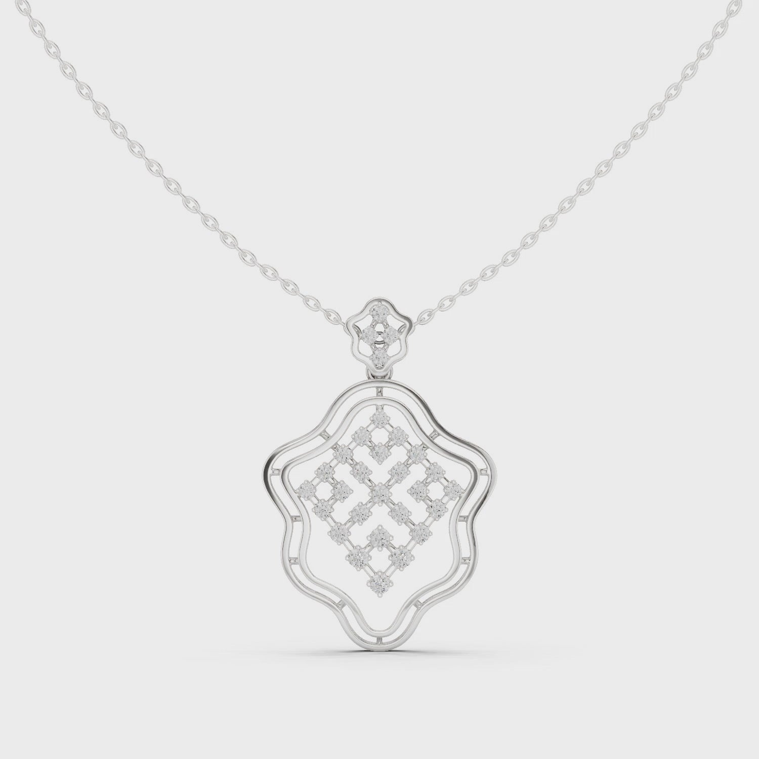 Silver chain necklace with ornate geometric lattice diamond pendant in scalloped frame