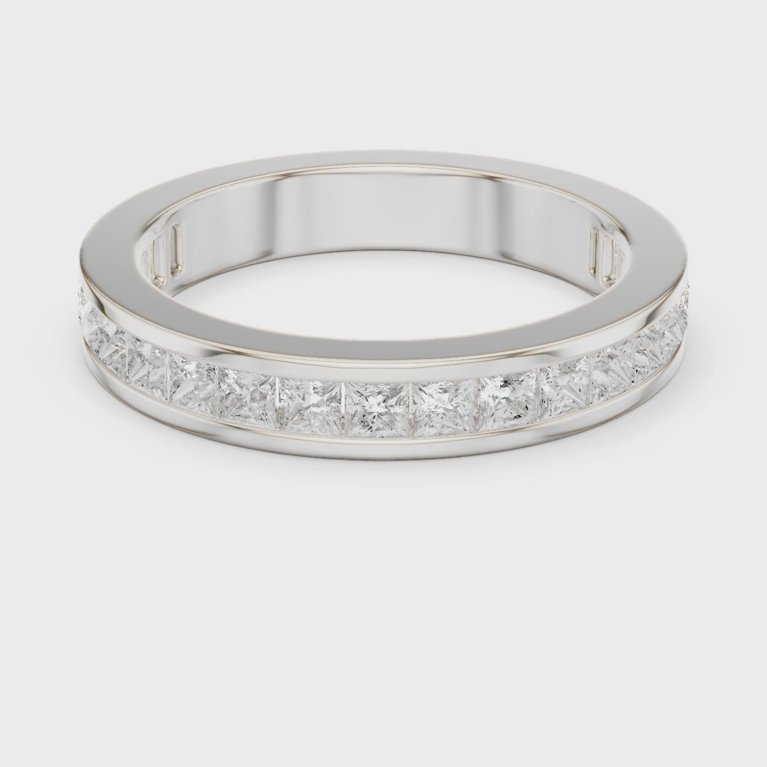 Princess cut channel set eternity ring with flush set square stones all around