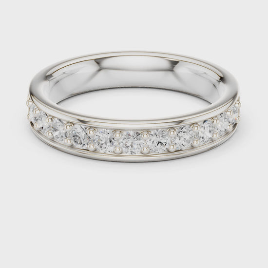 Channel set eternity band ring with continuous row of sparkling stones
