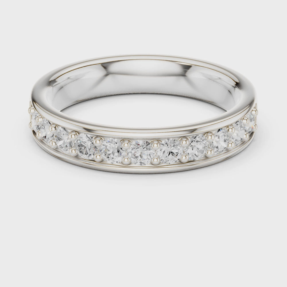 Channel set eternity band ring with continuous row of sparkling stones