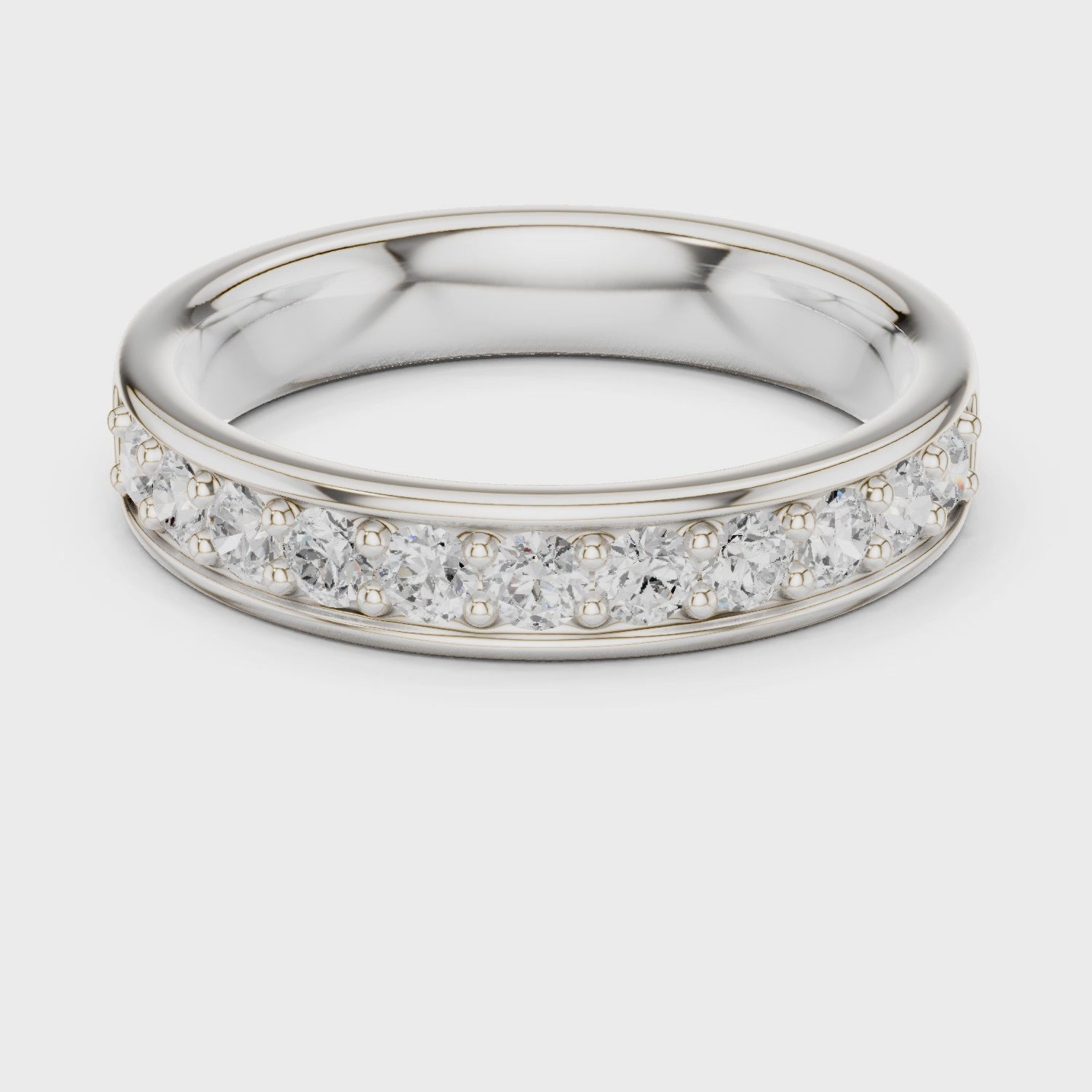 Channel set eternity band ring with continuous row of sparkling stones