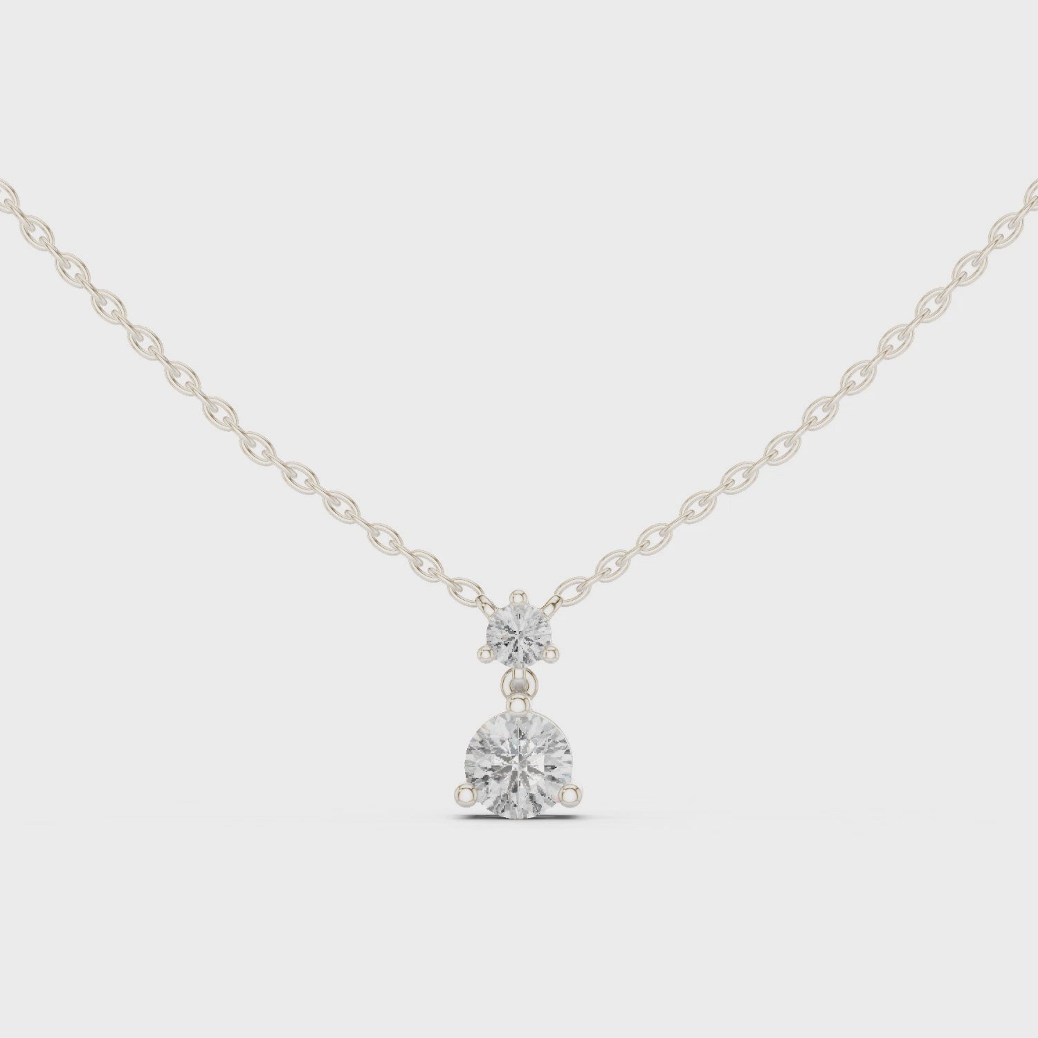 Two stone round brilliant solitaire diamond pendant necklace with prong setting