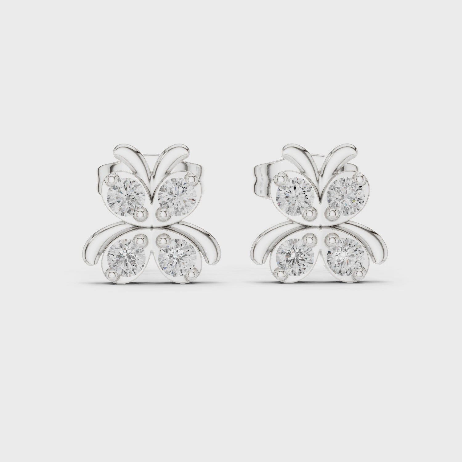 Butterfly stud earrings with sparkling stone detailing