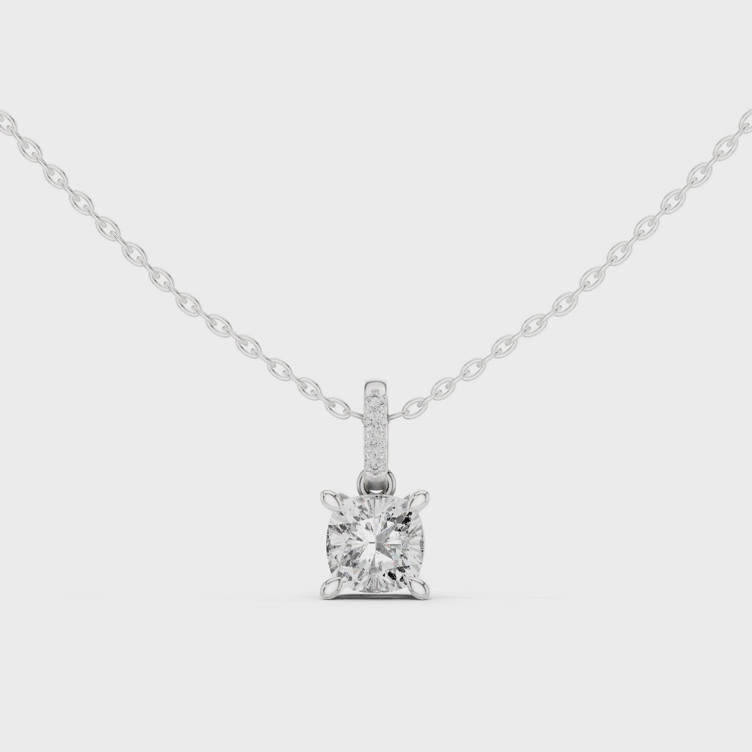 Cushion cut solitaire diamond pendant necklace with pave bail setting