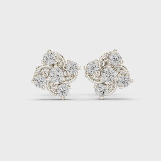Trefoil stud earrings with swirl and sparkling stone detailing