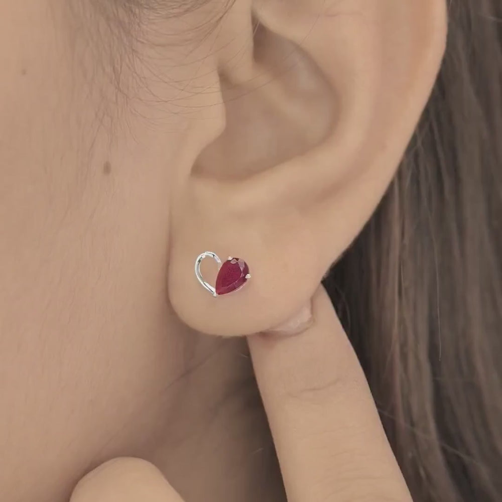 Ruby red heart loop stud earrings with open teardrop swirl base and pear stone top