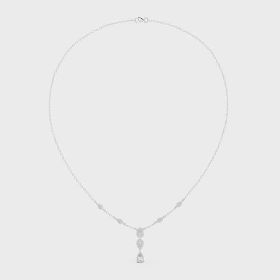 Pear and marquise diamond drop station necklace with bezel set chain accents