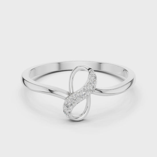 Infinity knot ring with sparkling figure eight top and plain slim band