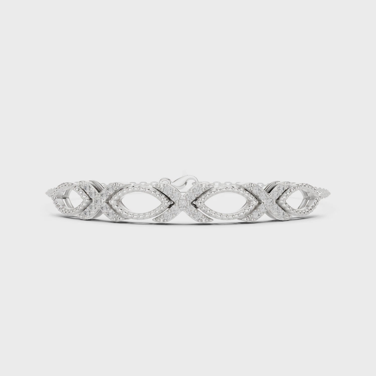 Silver bracelet with interlocking infinity XO pattern links and pavé crystal accents