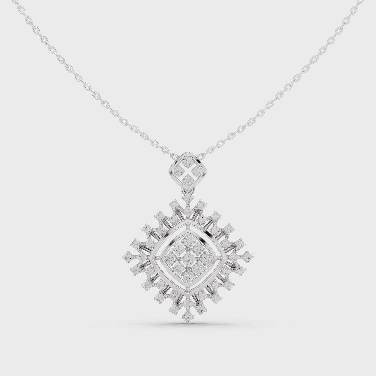 Geometric snowflake diamond pendant necklace with baguette and pave cluster setting