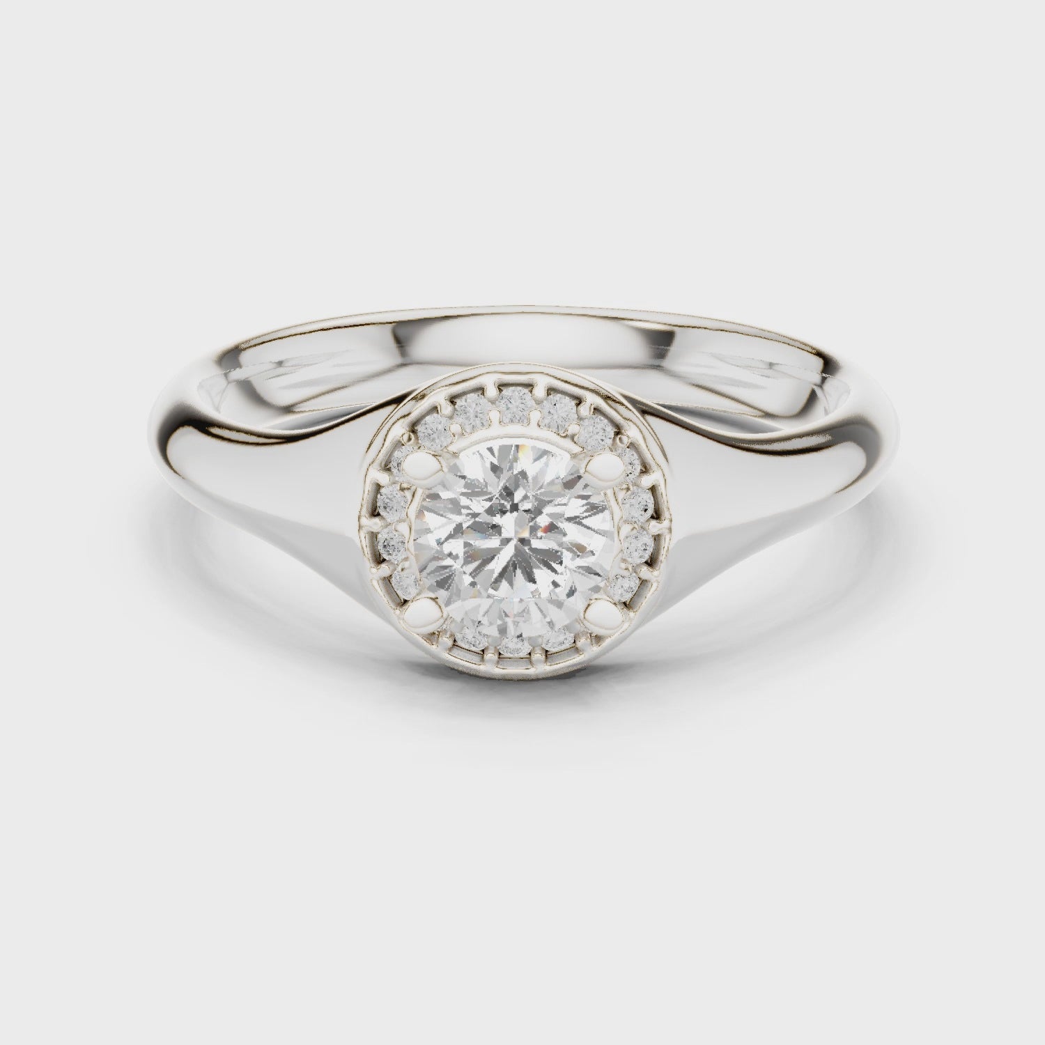Halo solitaire engagement ring with pave set surround and plain polished band