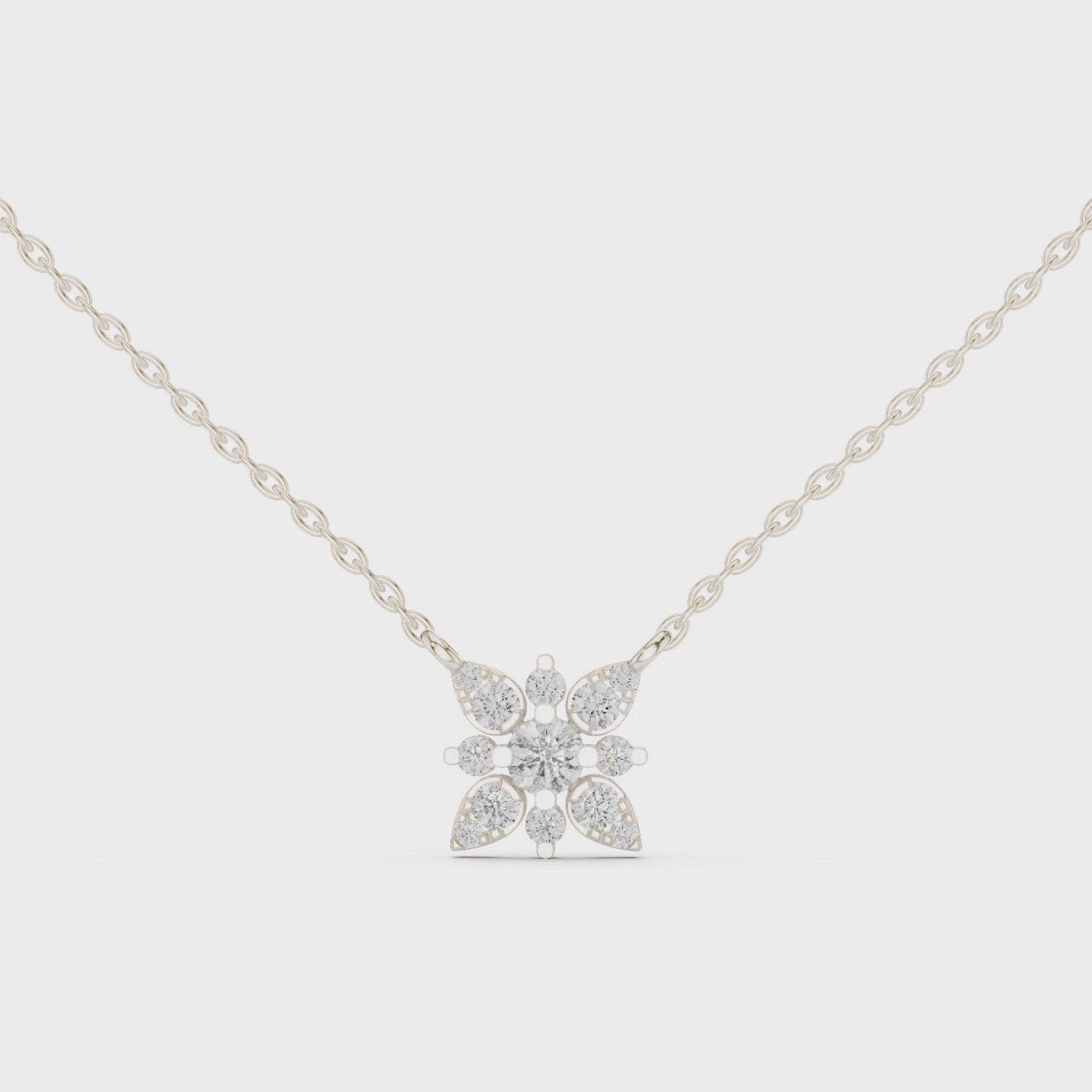 Floral marquise diamond pendant necklace with round brilliant centre stone