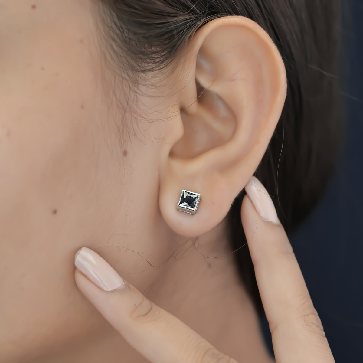 Black princess bezel stud earrings with channel set flat square frame
