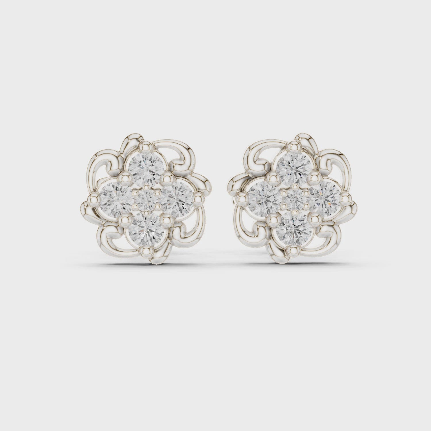 Floral filigree cluster stud earrings with intricate scrollwork detailing