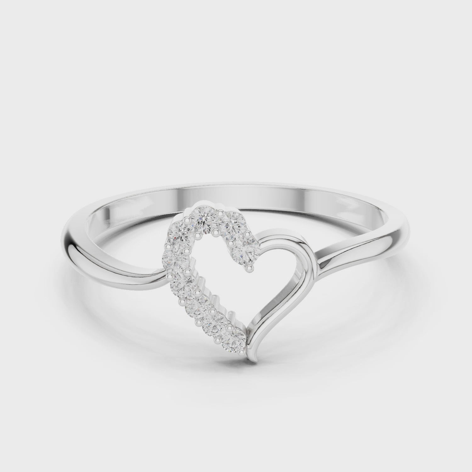 Open heart ring with half studded outline and polished slim band