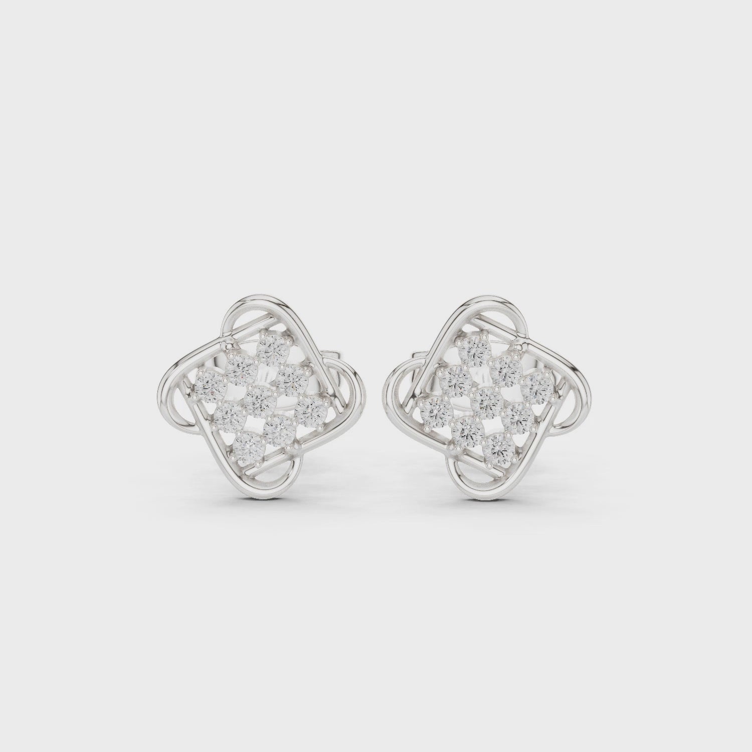 Evergreen diamond stud earrings with cluster wing design and push back setting