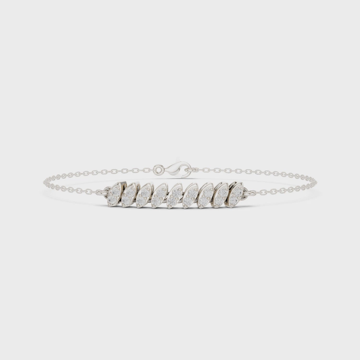 Marquise twist chain bracelet with graduated leaf motif centre detailing