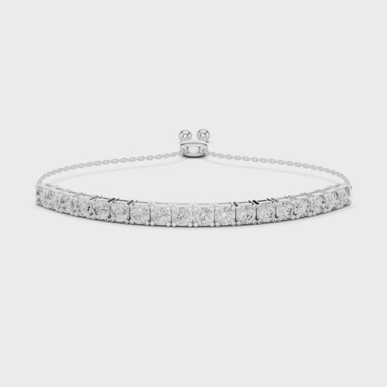 Tennis adjustable slider bracelet with prong set round stone row detailing